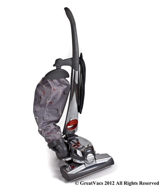 Reconditioned Kirby Sentria upright vacuum cleaner featuring the motor unit, outer cloth bag, TechDrive self-propelled controls, carpet nozzle, and upright cleaning design.