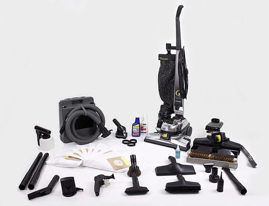 Reconditioned Kirby G6 upright vacuum cleaner with outer cloth bag, carpet cleaning head, hose, genuine Kirby attachments, shampooer system, and accessory bundle displayed together.